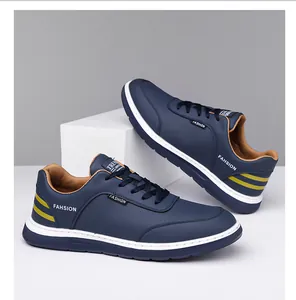 Detail view of navy blue sneaker with yellow stripes and breathable perforated surface