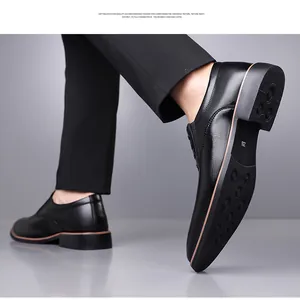 Detail of black leather business shoe showing the non-slip sole and premium texture