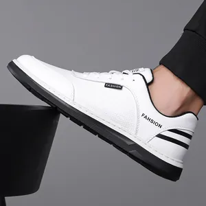 White minimalist men's fashion sneakers with lace-up closure and anti-slip soft soles