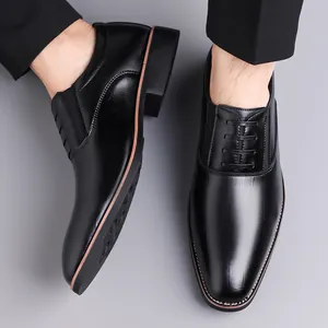 Men's formal black leather slip-on business shoes with elastic side and brown sole trim