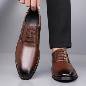Polished dark brown men's business dress shoes with gradient toe and slip-on design