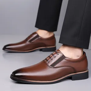 Men's brown formal business shoes with gradient toe and sleek lace-up design in indoor setting