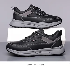 Detail of black men's casual sneaker with grey textured sole and fashion side label