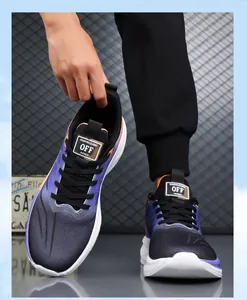 Detail of breathable mesh upper with purple gradient and striped side on sports shoes