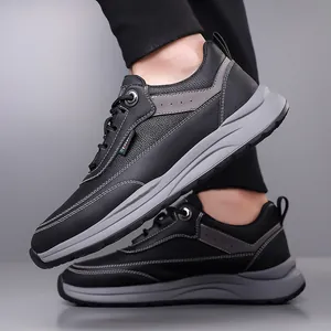 Men's fashion casual sneakers in black and gray with leather panels and lace-up design