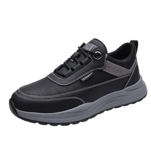 Men's casual sneakers in black litchi leather with gray patchwork and fashion label
