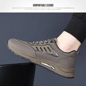 Detail view of khaki casual men's sneakers with four stripes and silver midsole accents