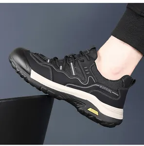 Detail view of breathable mesh upper and WARRIRL branding on black and white sport shoe