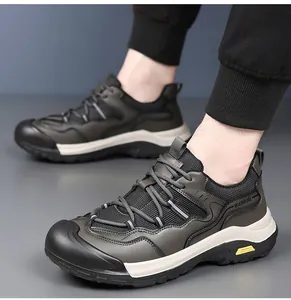 Detailed macro view of non-slip rubber outsole and mesh texture on men's hiking shoes