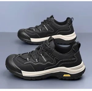 Detail of men's hiking shoes showing mesh texture and non-slip rubber outsole
