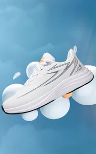 Detailed close-up of white lightweight sneakers with streamlined design and shock-absorbing sole
