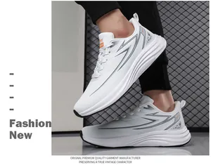 On-foot view of white sporty sneakers featuring grey lightning patterns and thick soles