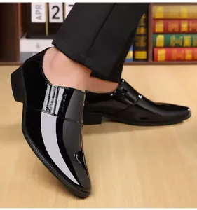 Close-up of black patent leather business shoes for men with sleek mirror finish