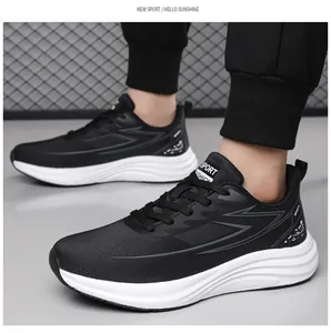 Side view of lightweight black and white men's sneakers featuring a breathable mesh upper
