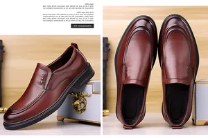 Detail view of brown business loafers with embossed texture and durable rubber soles