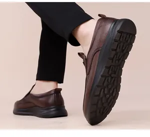 Detail view of brown leather loafers with thick anti-slip rubber soles for men