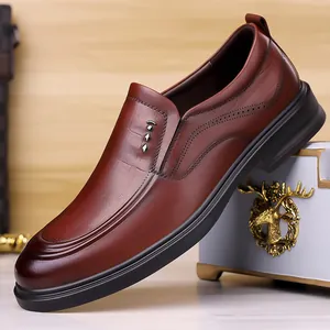 Mens brown leather loafers with silver diamond buckles and brogue detailing