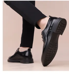 Close-up of black polished leather men's derby shoes with anti-slip thick rubber soles