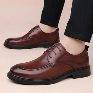 Men's brown leather derby shoes with elegant brogue detail and durable rubber soles
