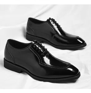 Macro detail of black patent leather brogue shoes with polished mirror finish and stitching