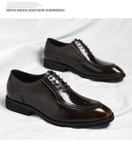 Detail of dark brown leather brogue shoes with burnished toe and polished finish
