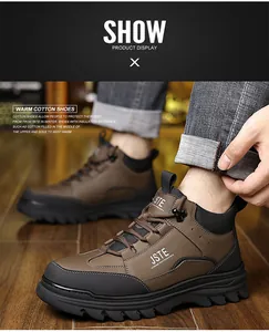 Close-up of brown leather winter boots with warm lining and anti-slip rubber soles