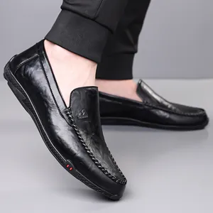 Men's black leather loafers with M FASHION metal logo and non-slip rubber soles