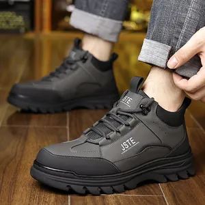 Men's winter leather boots with wool lining and non-slip rubber soles in dark grey