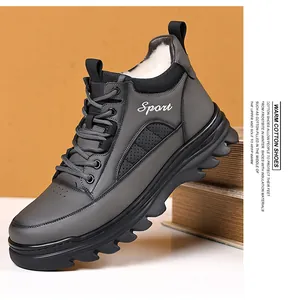Detailed view of winter snow boots with thick white fur lining and non-slip rubber sole