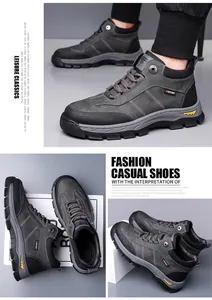 Detail of dark grey high-top winter boots with anti-slip rubber sole and sport logo