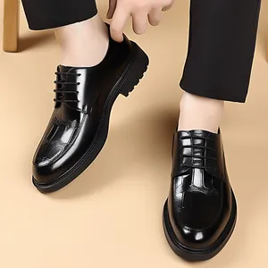 Classic black leather business shoes for men with elegant crocodile pattern and lace-up design