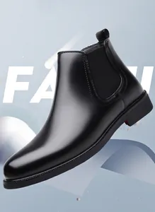 Vue détaillée de bottines Chelsea en cuir noir avec empiècements élastiques et coutures