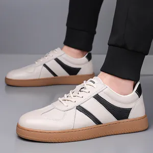 Men's leather casual sneakers in beige and black with durable brown rubber sole