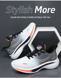 Detail of grey gradient running shoes with orange and blue accents on a geometric display