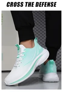 Macro shot of mint green breathable mesh and white cushioned sole on running shoe