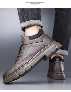 Action shot of brown leather boots showing side detail and non-slip sole on foot