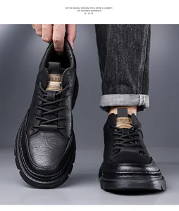 Detail of black pebbled leather Martin boot with branded tongue tag and lace-up design