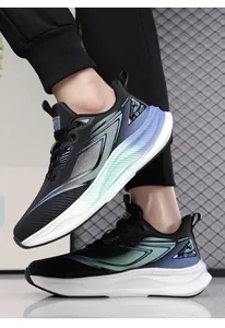 Detail of waterproof running shoes with black leather upper and blue gradient lightning design