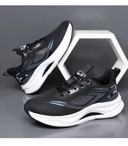 Detail of lightweight black mesh running shoes with thick white soles and blue accents