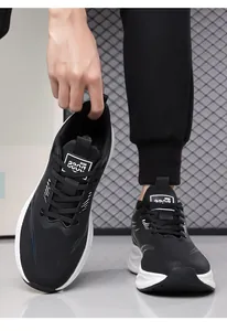 Macro detail of breathable black mesh upper and lightweight non-slip sole of the running shoe