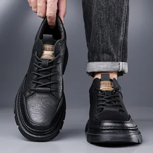 Men's black low-top leather boots with durable non-slip rubber soles and thick laces