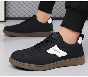 Detailed side view showing FASHION logo and non-slip rubber sole of men's casual sneaker