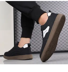 Detailed side profile and anti-slip rubber sole of black fashion casual sneakers