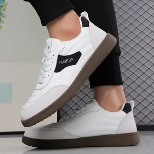 Men's fashion sneakers with white leather upper, gray suede trim, and brown rubber sole