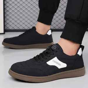 Men's fashion casual sneaker in black fabric with brown rubber sole and lace-up design
