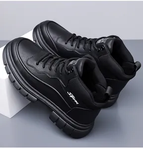 Detailed view of black leather high-top boots with textured finish and sport lettering