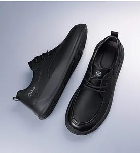 Detailed side view of black matte casual leather shoes with thick rubber soles and laces