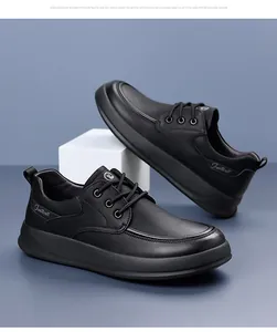 Detail of black matte leather sneakers with Justwell branding and thick platform soles