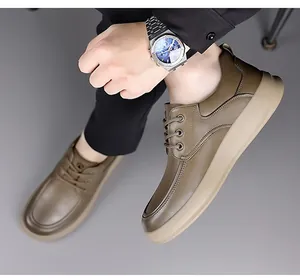 Close-up of men's brown leather casual shoes with non-slip beige sole on model