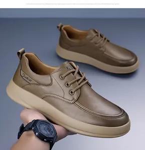 Close-up of brown casual leather shoe with laces and stylish thick rubber sole